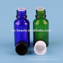 Glass bottle with tamper evident stop cap